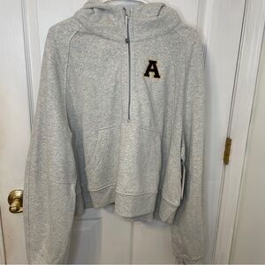 Light grey Lululemon scuba quarter zip hooded jacket with A patch